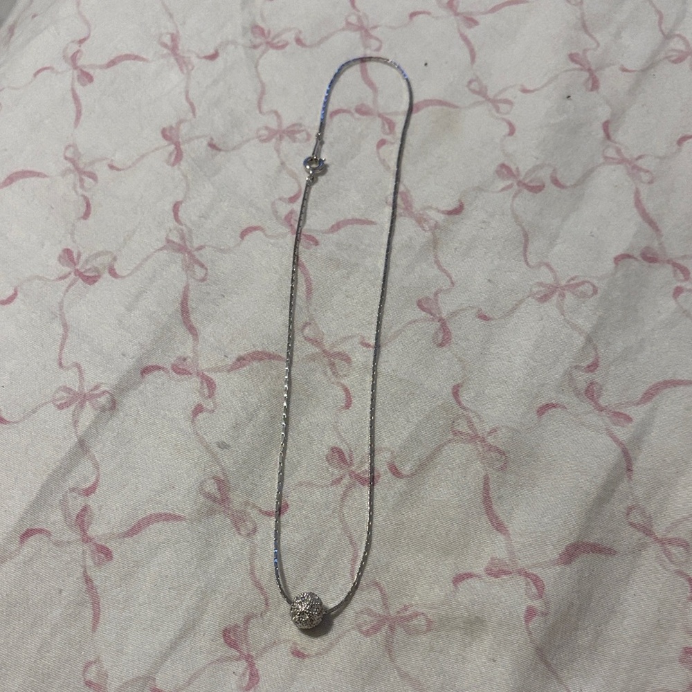 Elegant Silver Necklace with Intricate Pendant